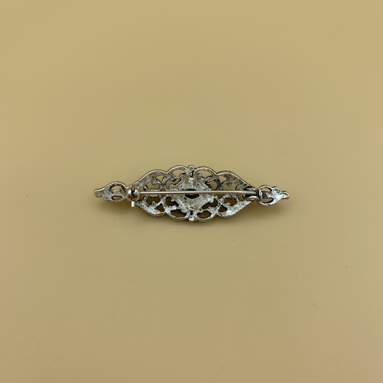 Anstecknadel Rubin Rückseite